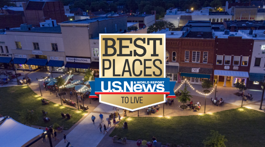 An aerial photo of downtown Hickory in the evening with the Best Places to Live logo