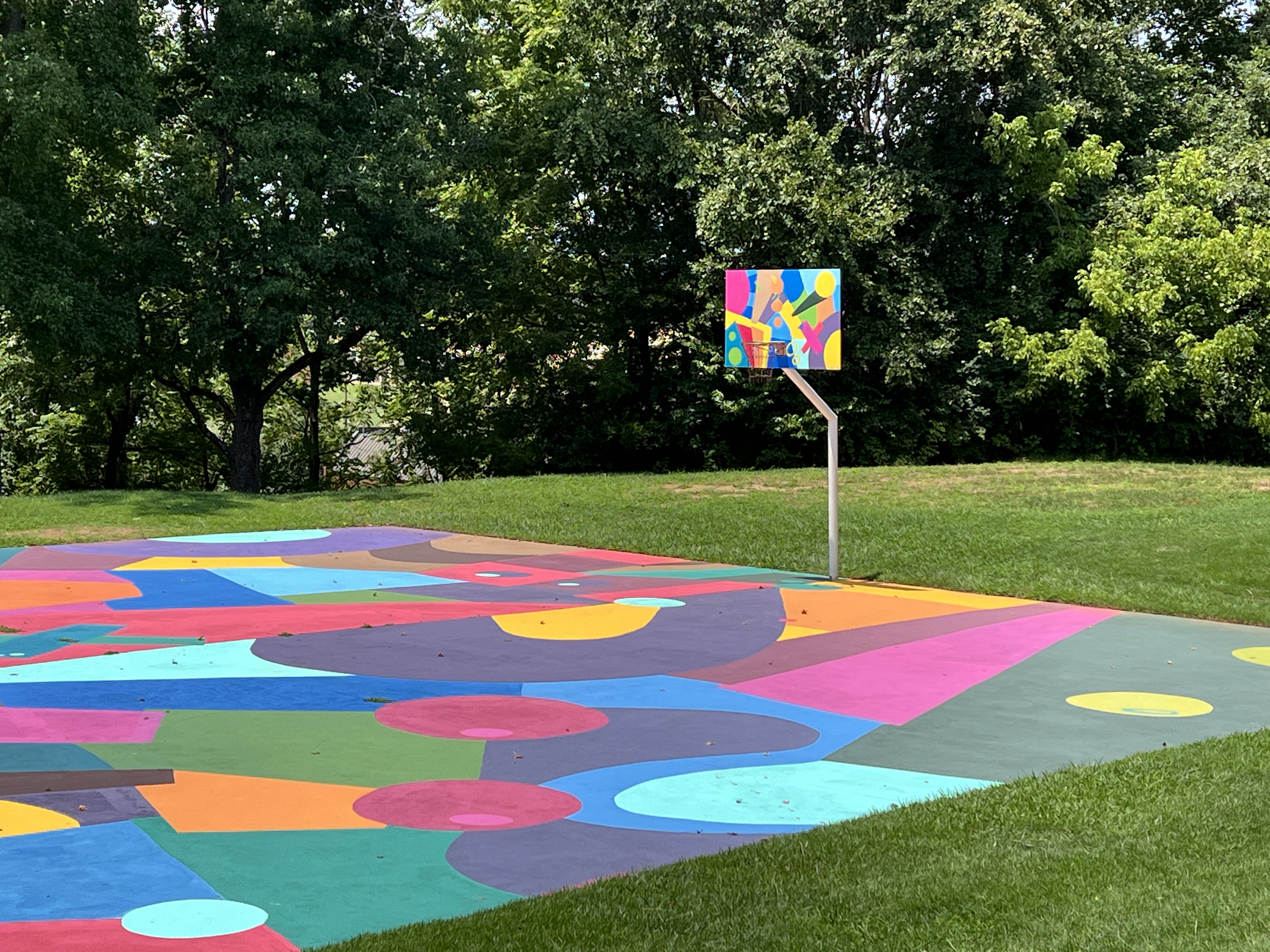 Outdoor Basketball Court with mural