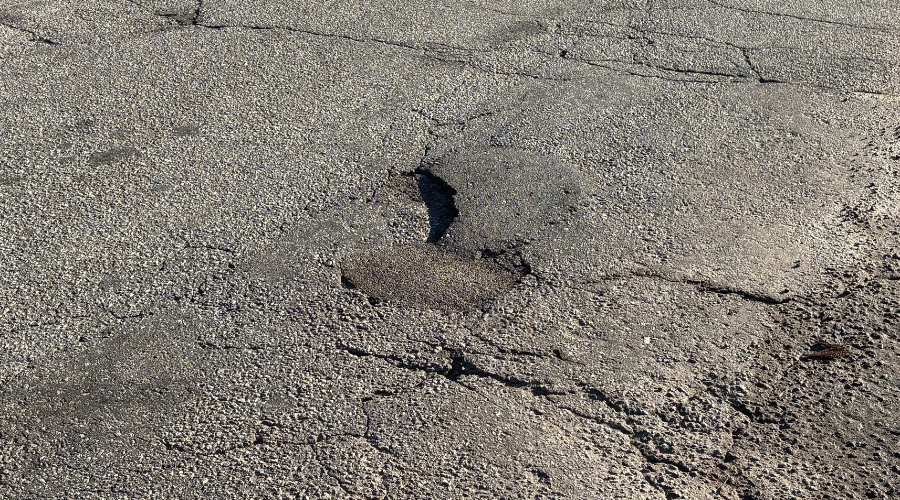 A pothole in the street