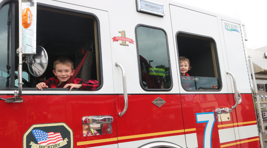kids in the fire truck at Fire Prevention Week Kickoff Event